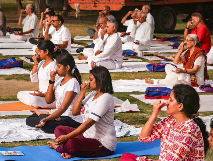 Women doing mass yoga