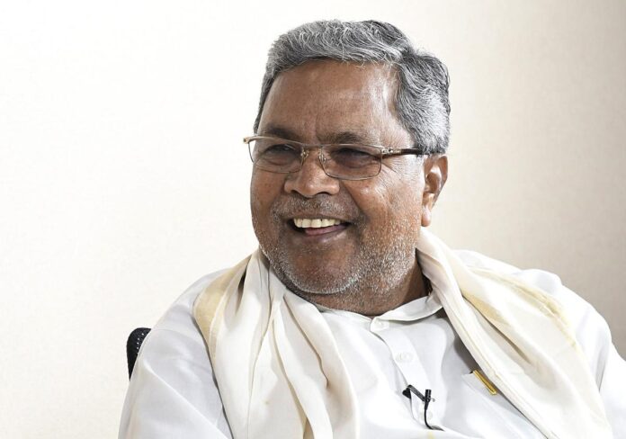 CM Siddaramaiah smiling