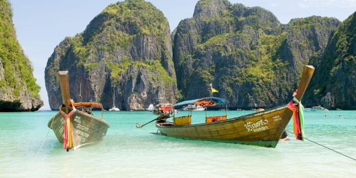 Boats and mountains in sea