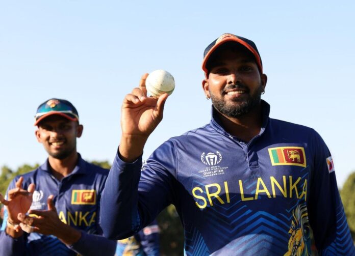 Wanindu Hasaranga holding a ball